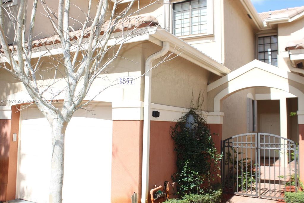 Photo of 3857 Tree Top Dr #3857, Weston, FL 33332 (MLS # A11974535)