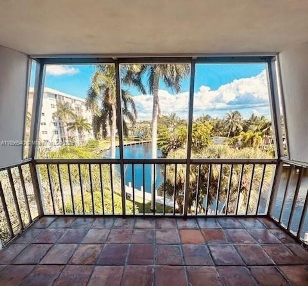 Photo of 3000 NE 16th Ave #408, Oakland Park, FL 33334 (MLS # A11896940)