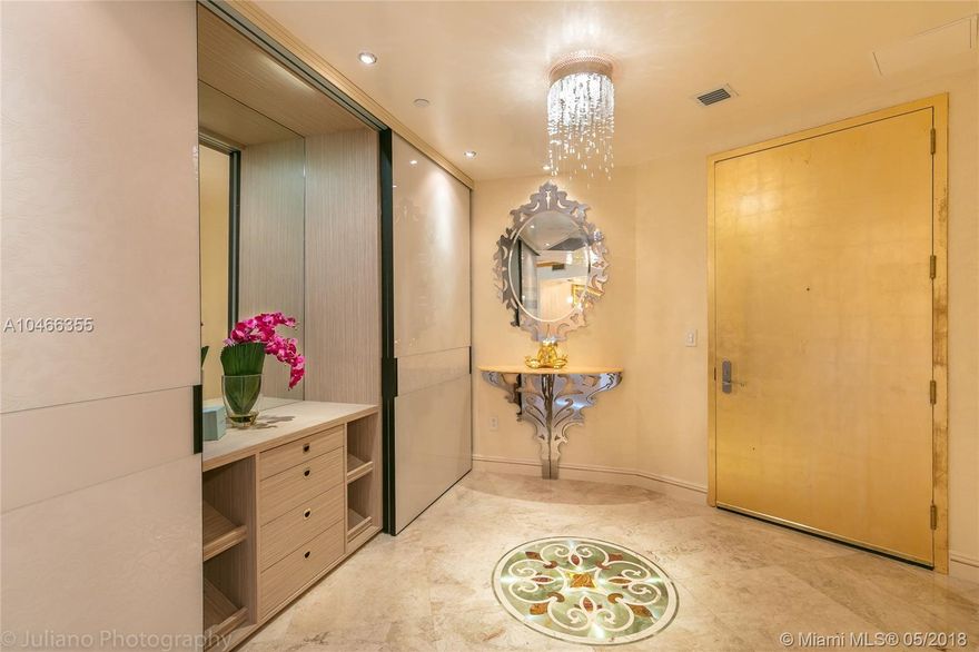 Rare find and unlike any other unit! Professionally decorated and fully furnished 2BR/2BA unit with beautiful Ocean views and massive patio that leads to a private pool deck! Entry through a private foyer: Marble & Onyx floors, Custom designed kitchen, 24karat gold-plated accent wall, Ultra modern luxurious bathrooms, Master bedroom with Venetian Plaster and Swarovski crystal ceiling, Security cameras throughout the unit, built-in entertainment center, Grand chandeliers, built-in bar. Enjoy all the Trump Amenities!