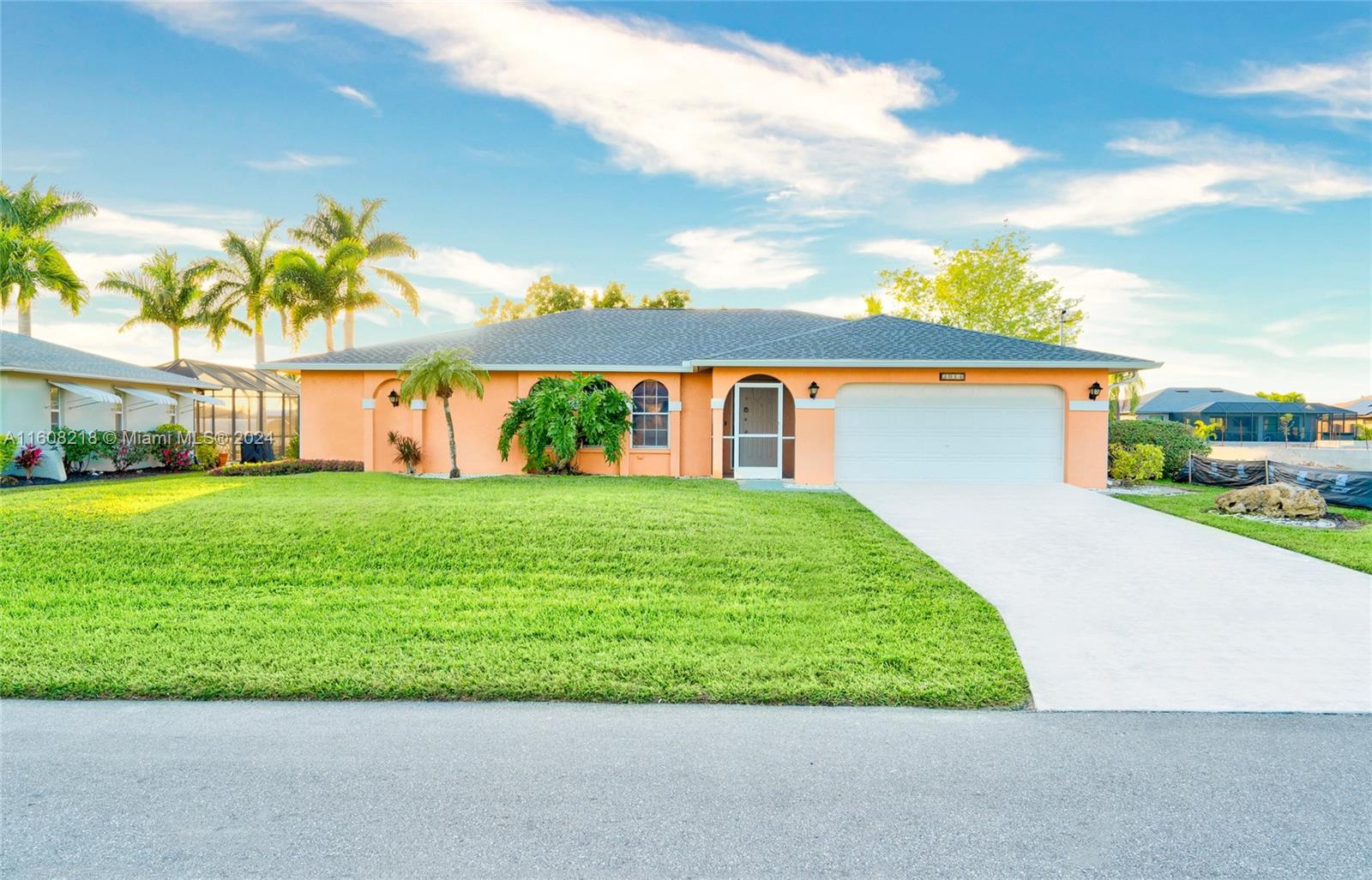 Welcome to your waterfront paradise! Situated in sought-after SW Cape Coral, this stunning home boasts captivating Western exposure, offering breathtaking sunset views over the tranquil canal. Spanning over 1900 square feet of meticulously maintained living space. Living room and dining area. The heart of the home is the well-appointed kitchen, complete with ample cabinetry, a convenient pantry, an island for added workspace, and a pass-through window, perfect for serving meals alfresco on the screened lanai. 3 bedroom, 2 bathrooms. Additional features include tile flooring throughout, a new roof installed in 2023, and all assessments paid, offering peace of mind for years to come. Schedule a private showing today!