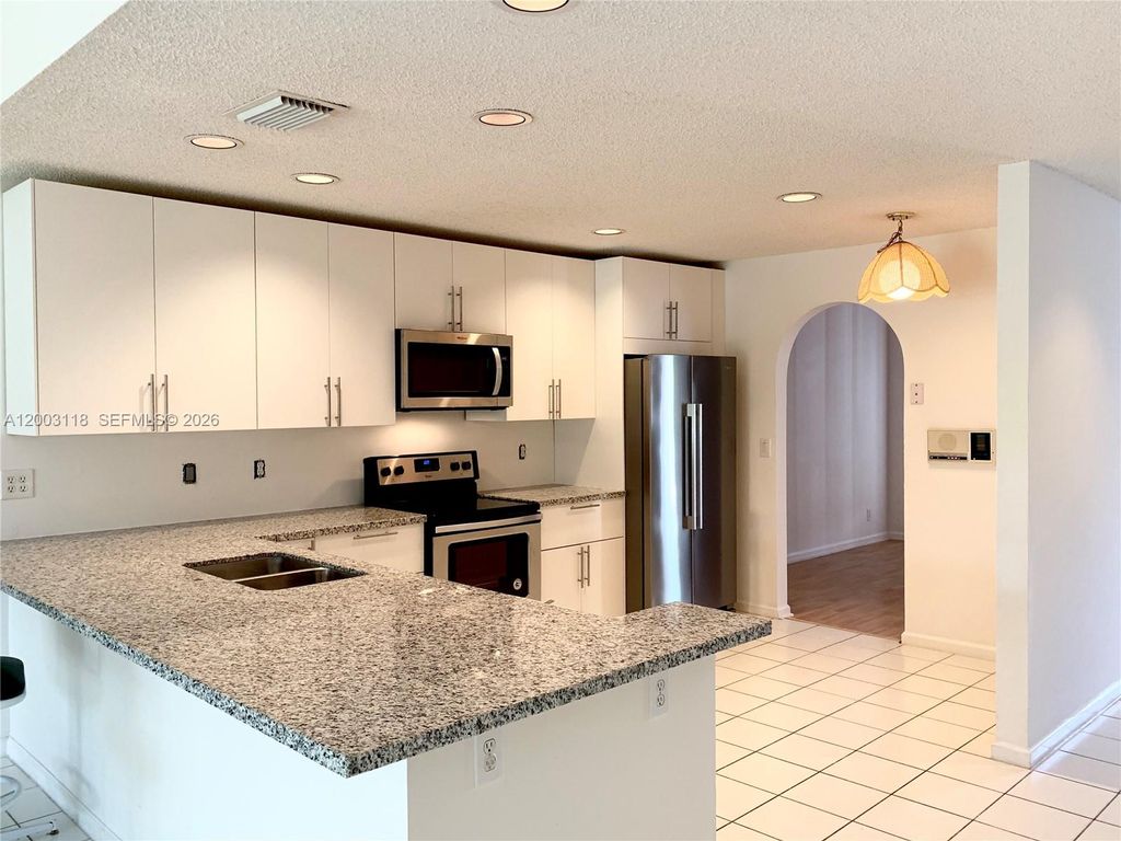 Photo of 2444 Stonegate Dr, Wellington, FL 33414 (MLS # A12003118)