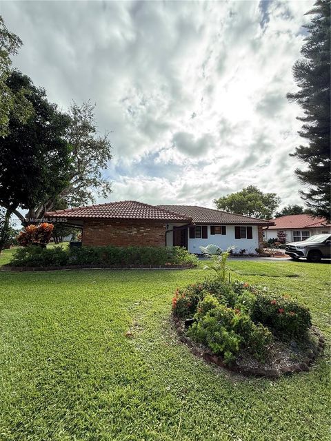 Photo of 300 NW 42nd St, Boca Raton, FL 33431 (MLS # A11918821)