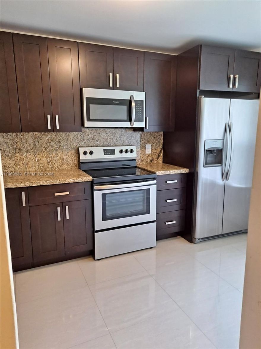 Beautifully updated 2 Bedrooms / 2 Bathrooms unit in a great location! * Conveniently situated on the first floor* Great layout * Stainless steel appliances * Porcelain floors * Water filter system * Washer & dryer * Gated community * Just a few minutes away from Walmart Supercenter , SAM'S Club, restaurants and more! * Easy access to Florida Turnpike and major roads* 1 assigned parking space in front of the unit + plenty of guest parking * Best unit available in the complex * Agents bring your clients with confidence