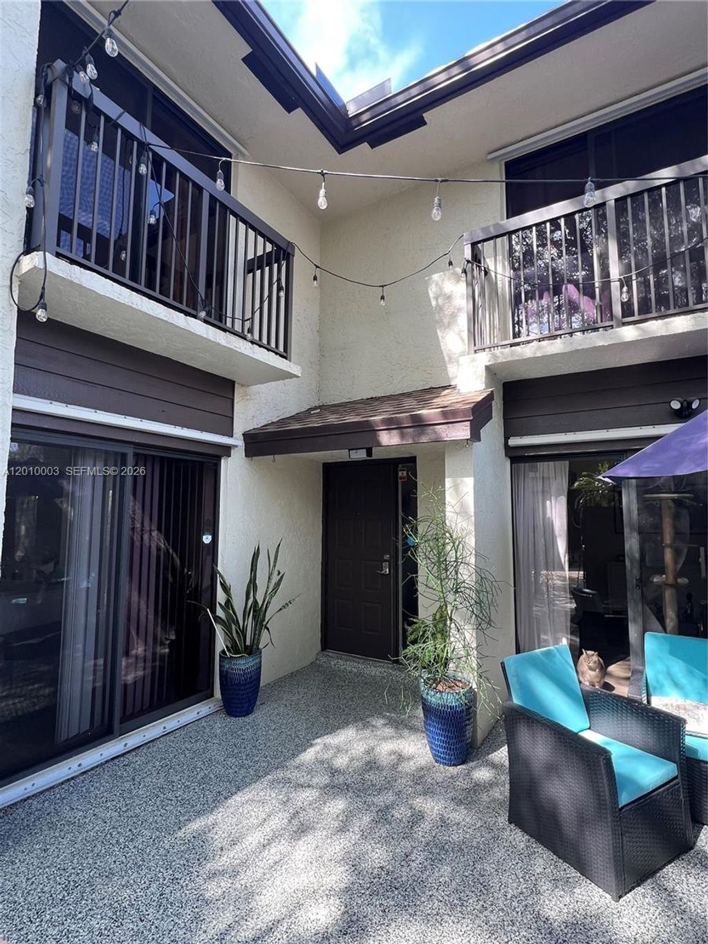 Photo of 3357 Cocoplum Cir #33133, Coconut Creek, FL 33063 (MLS # A12010003)