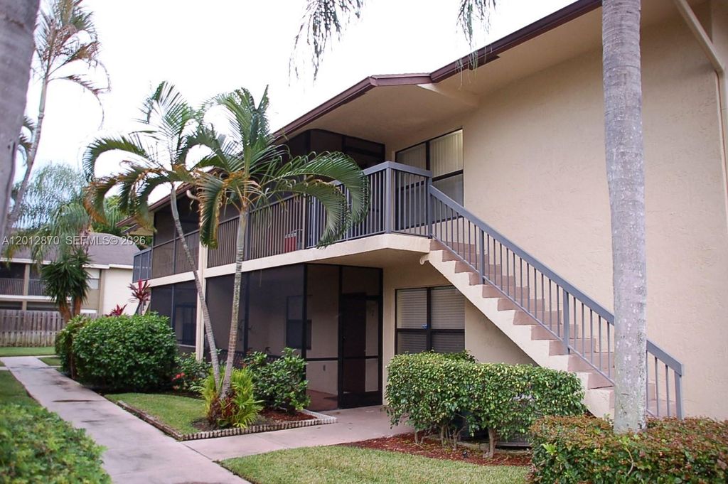 Photo of 10025 Winding Lake Rd #202, Sunrise, FL 33351 (MLS # A12012870)
