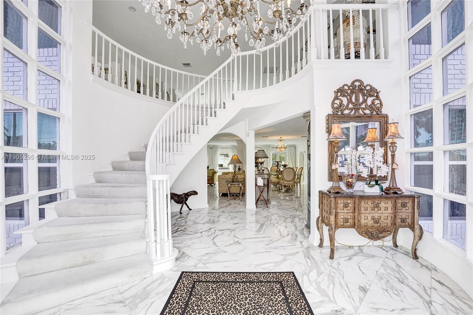 Discover luxurious waterfront living in this exceptional rental at 2889 Northeast 35th Street, Fort Lauderdale, Florida. This expansive home offers 5 bedrooms and 3.5 bathrooms within 5,207 square feet of exquisite living space. Featuring a circle drive and a spacious garage, this fully furnished residence is designed for both elegance and convenience. Enjoy serene canal front views from the comfort of your home, providing a perfect setting for relaxation and tranquility. The open floor plan is ideal for entertaining, with ample natural light enhancing the welcoming atmosphere. With its prime location and stunning features, this property offers a unique opportunity to experience the best of Florida's waterfront lifestyle.