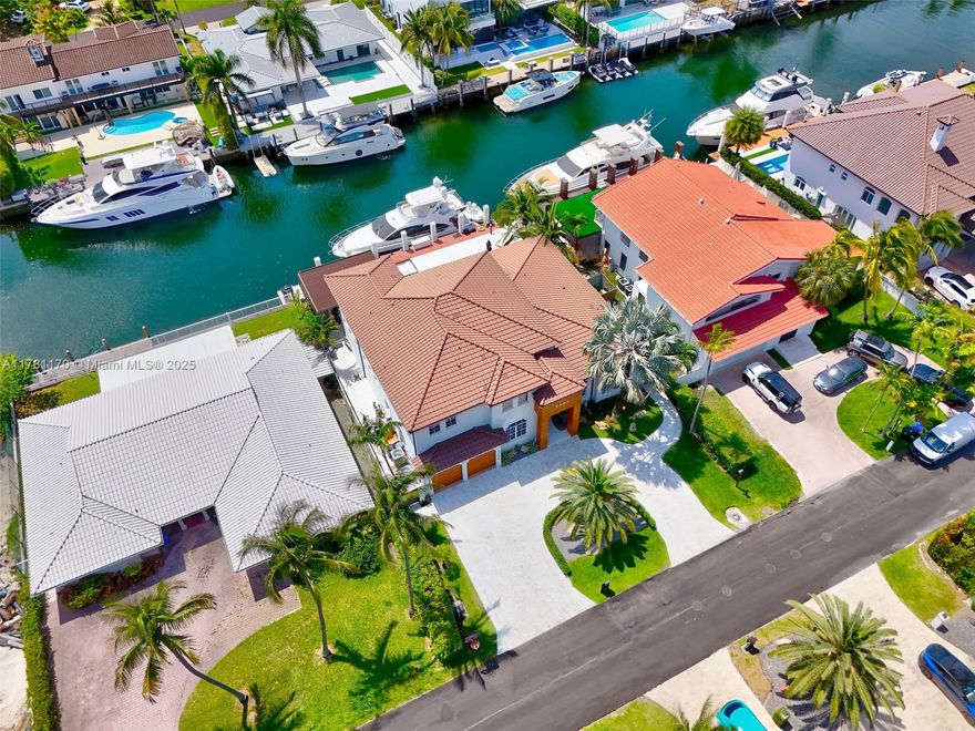 *Welcome to Miami's Prestigious Eastern Shores, Fully Upgraded Waterfront Luxury Property, This Smart Residence with Stunning 6-Bedroom/5-Bathroom, Offers 4365 SqFt of living Space and 90-feet of PRIME waterfront. There are no-fixed bridges and a large dock for up to an 80-foot yacht. This property provides unparalleled access for boat enthusiasts with direct water access and breathtaking views. Inside, discover spacious living areas, 20ft high ceilings throughout, elegant finishes, modern amenities and seamlessly integrating indoor-outdoor living. This is the essence of Miami's coveted waterfront lifestyle is Situated in a gated neighborhood, Minutes Away from Sunny Isles Beach, Aventura Mall, Dining & Oleta River State Park* Just Follow Your Dream And Make it Happen.