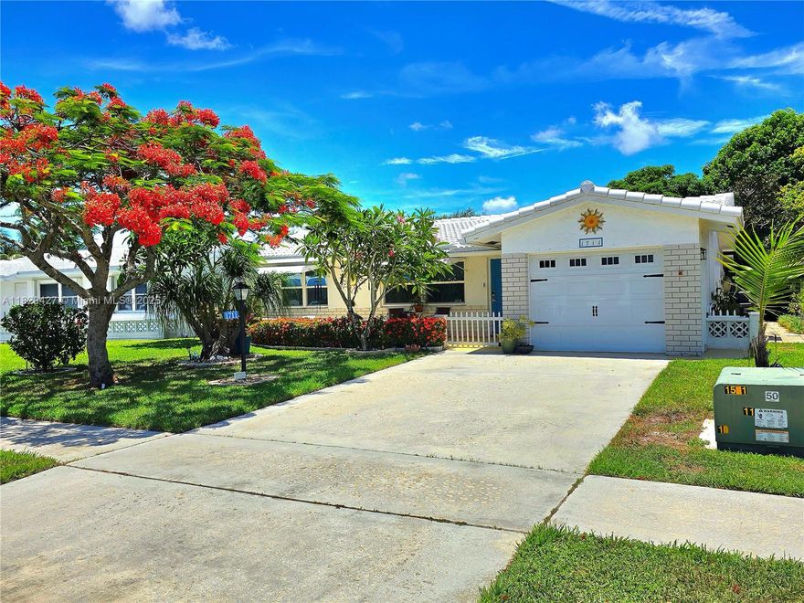 Fabulous opportunity in Leisureville. Low HOA fee (237 per mo) that pays for lawn care, TV, internet, and club house w/pool. Only 3 miles to the ocean, and located close to all types of shopping. This beautiful waterfront home is also full of upgrades. The 2021 roof  is a comercial grade, 50 year, certified cement tile w/modified bitumon. The kitchen & baths have been renovated with solid wood, premium quality cabinets. The same extra large tiles throughout the home and laid on the diagonal. NO CARPET! Updated impact windows throughout this beautiful home, with working clamshell shutters for extra security. One of the few leisureville homes with a 10X30 screen room in addition to the 10X30 family room! Pet friendly!! High Efficency AC w/UV light! A well maintained home that you will love!