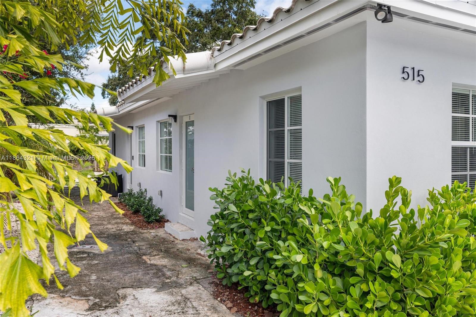 Welcome to this beautifully renovated 2-bedroom, 2-bath residence. Featuring light wood porcelain floors throughout, hurricane impact windows and doors, a brand-new washer/dryer, stainless steel appliances, and abundant natural light. Enjoy weekends entertaining or relaxing in the oversized backyard, perfect for grilling, lounging, and sunbathing. Two parking spaces included. Ideally located just off Biscayne Blvd, within walking distance to Morningside Park, local restaurants, and shops, and only a 15-minute drive to the beach and Downtown Miami.