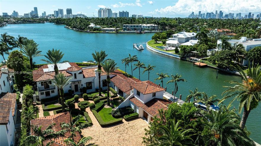 Rarely available for sale, perfectly located between prestigious North Bay Road, Sunset Island and close to Sunset Harbor, this Mediterranean masterpiece offers beautiful panoramic views of Sunset Lake. This unique corner lot has a rare 325’ of waterfrontage with 2 docks, allowing a 100-foot+ boat without obstructing the view. The 2-story residence sits on a private 25,085 SF lot, offering a gourmet kitchen, breakfast room, media room, parental suite with his/her baths, walk-in closets, detached guest house, maid quarters, offices, patio, and a 3-car garage surrounded by beautiful, manicured landscaping. More than an estate, it is a unique & precious asset to own. No power lines interfering with the views, sunset island guard house overlooking the entrance, no house next door on the west.