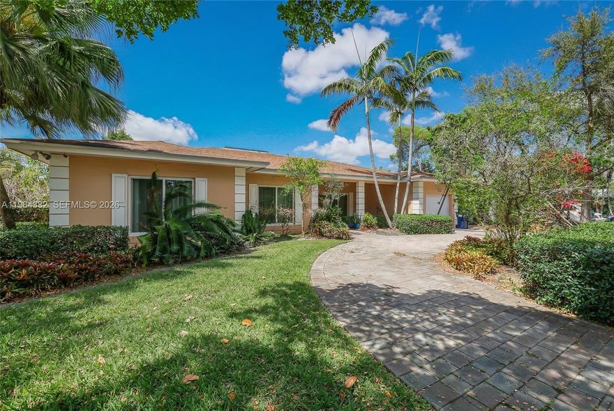 OPEN SUN Spectacular Custom-Built Corner Pool Home in Adorable Miami Springs. Soaring 9 Foot Ceilings Throughout, Bright Light, Flowing Spaces. Large Main Living Room is Beautifully Complemented by Open-Air Atrium, Flooding the Interior with Natural Light. Epic Family Room w/ True Naturally Textured "Pecky Cypress" Paneling, Fantastic Built-In Wet Bar + Tranquil Pool Views. AMAZING LAYOUT W/ SO MANY FEATURES. PERFECT Grand Primary Suite, TWO FULL SIZE WALK-IN CLOSETS W/ CUSTOM ORGANIZERS + Spectacular Master Math, Ready for Your Finishing Touches. Amazing Pool w/ SUMMER KITCHEN + CABANA BATH + NEWER SCREENED PATIO. SPECTACULAR CORNER LOT, Large Driveway, Double Enclosed Back, FULL CONCRETE PERIMETER FENCE, Lush Landscaping. Only 6 Homes Per Block - Rare+COMPLETE PRIVACY - Compared to Typical 7 to 9. Countless Recent Upgrades: ALL IMPACT WINDOWS & DOORS (Huge  Insurance Savings + Peace of Mind), 2 Newer Central ACs - Carrier+Rheem '22, All New Kitchen w/ Stone Counters, KitchenAid Appliances '23, NEWER ROOF '19, 2 Guest Baths Renovated w/ TOTO TOILETS '15, Pool Resurfaced '15, Freshly Painted Inside+Out, 37 Leviton/Lutron Switches '26, Dedicated Laundry, NO HOA + NON FLOOD ZONE (Huge Savings + Peace of Mind) + Garage + Functional Central Vac, ETC, ETC, ETC!  A++ Location: Walk 4 Blocks to Springview Elementary, Bike to Miami Springs Circle along Trails for Lunch, 13 Mins to Wynwood, 10 to Miami International Airport, 18 to Brickell, 20 to Miami Beach. Call Today!