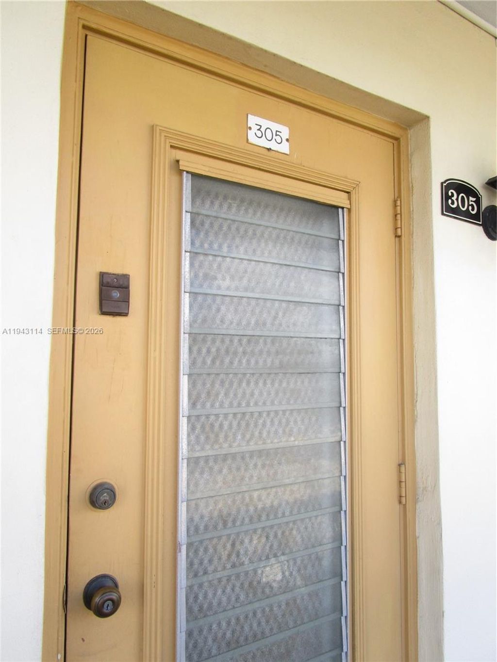 Photo of 5111 W Oakland Park Blvd #305, Lauderdale Lakes, FL 33313 (MLS # A11943114)