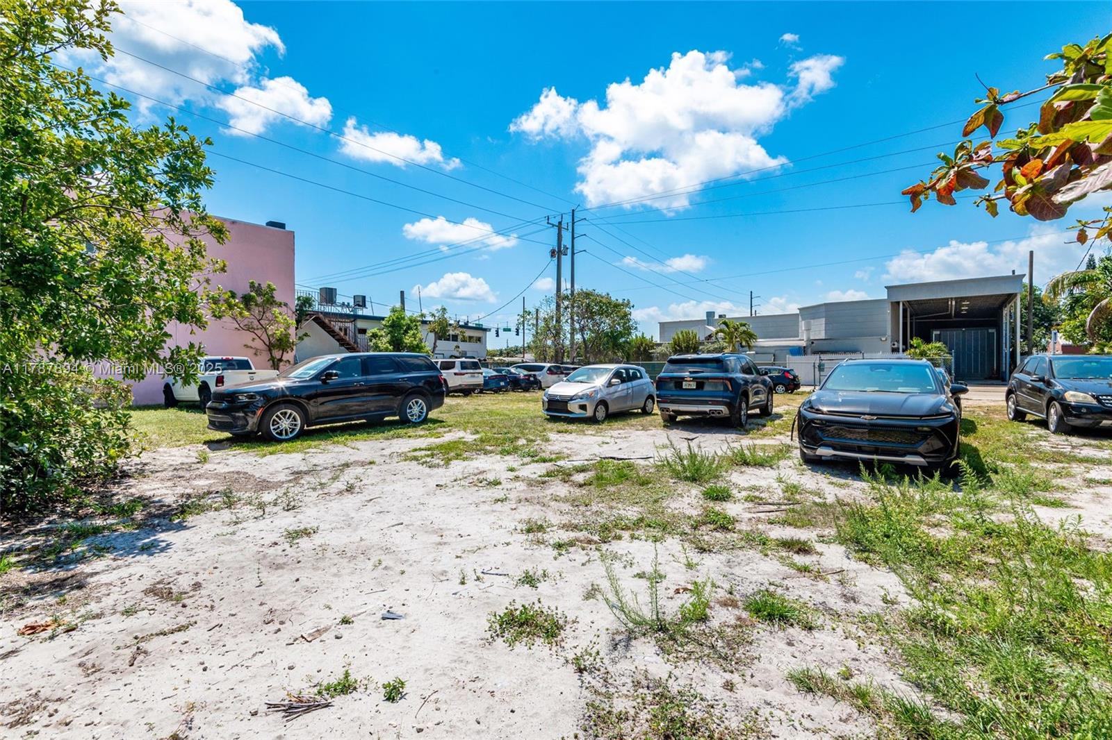 VACANT LAND LOCATED IN IN A SOUGHT-AFTER AREA , BEING USED AS A PARKINH ATEA FOR BODY SHOP . PRIME LOCATION
