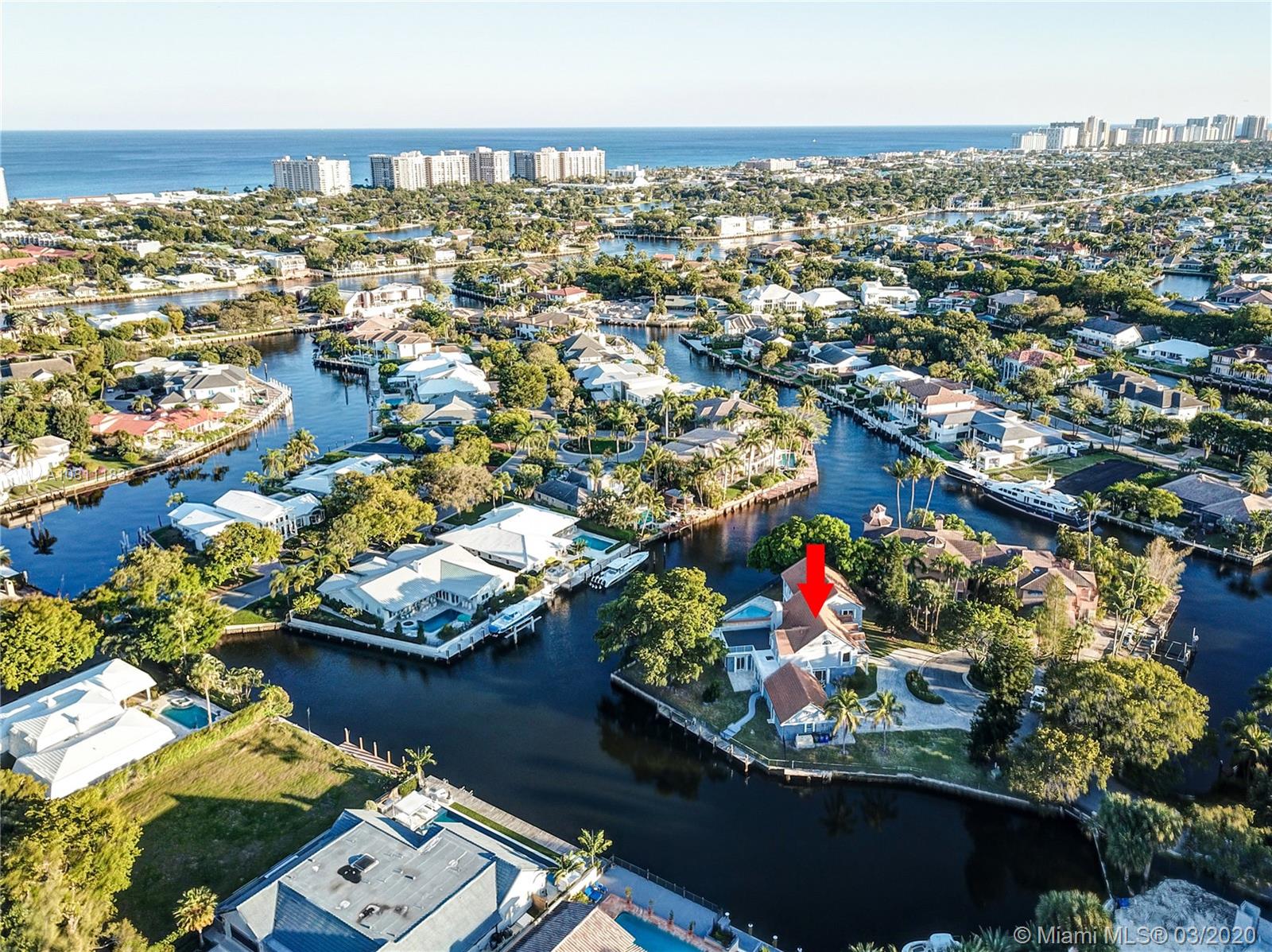 Rarely does an opportunity come about to own 425+- of Deep Water w/ no Fixed Bridges in a Secure, Gated Fort Lauderdale Community. 10 Compass Point is situated on over 1/2 an Acre. Just one of two Estates on this private enclave in Exclusive Bay Colony, one of Fort Lauderdale's top neighborhoods. Minutes from Fort Lauderdale Beach & nationally renowned Pine Crest School. Magnificent Home features Large Master w/ sitting area & Rooftop Deck, Elevator, Marble Flooring, Whole Home Generator, Hurricane Impact Glass / Shutters, 3 Gas Fireplaces and 3 Car Garage w/ lift for 4th. Gated Community w/ 24 Hr Armed Security. Just off the Intracoastal w/ easy access to the Atlantic via Hillsboro Inlet. Seawall extends to approx 188 ft on East Side of Property. Video Tour at https://vimeo.com/395654312