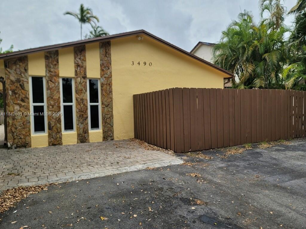 For rent, October 1, 2025, is a gorgeous two bedroom, two bathroom duplex in the prime area of Emerald Hills. This is a fantastic location across the street from TY Park in Hollywood. Centrally located near I 95, places of worship, schools, shopping, recreational areas, and 15 minutes from the beach. There are 2 bedrooms, 2 bathrooms, eat in kitchen, ample living room, backyard, parking for 2 vehicles, washer & dryer hookup. Tenant is responsible for first, last, and security. Rent is $2,500 per month, plus water/ garbage and electric. Tenant must have credit score of 650, or greater, no prior evictions, and provide check stubs to show proof of income.