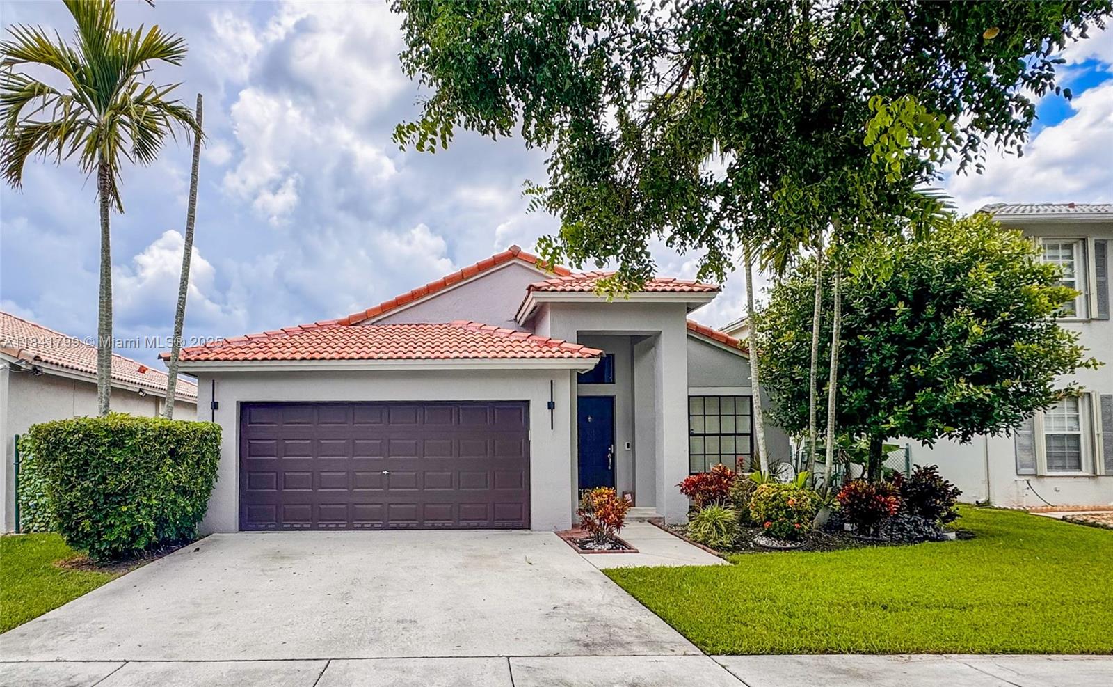 OPEN HOUSE SAT & SUN 1-4PM. CALL 954-228-0431 FOR GATE INSTRUCTIONS
Welcome to this beautifully updated 3 bed, 2 bath, lake-view home with pool in the gated community of Villages of Renaissance! This one-story home features a split-bedroom layout, fresh interior and exterior paint, and a modern, updated kitchen with stainless steel appliances. The spacious primary suite includes a renovated bathroom with modern finishes. Enjoy tranquil lake views from your pool and backyard—ideal for entertaining or relaxing. Other features include volume ceilings, tile flooring in main areas, and a two-car garage. Conveniently located near highways, shopping, dining, and top-rated schools. Move-in ready with pride of ownership throughout—don’t miss this one!