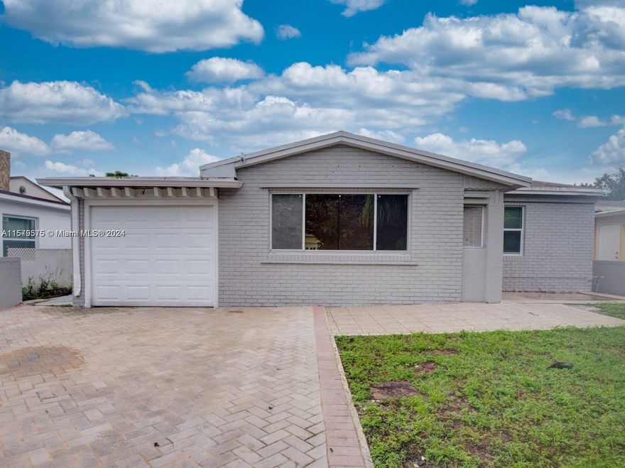 Fulfill your dream, enjoying this beautiful recently REMODELED home with avant-garde interior design, just 3.5 miles from the beach, this house would make an incredible vacation home or Airbnb. Located on a large lot with 10,260 square feet (0.24 acres), this well-built 5 bedroom/3 bathroom home has over 3,000 square feet of living space including a dining area, living room, family room, large . kitchen with granite countertops, laundry room, flex space and one car garage. The outdoor space has an in-ground pool with enclosure, built-in grill, and a large patio perfect for spending time with friends and family. To the rear of the house there are 2 separate structures that could be a shop, storage area or possibly converted into an apartment.