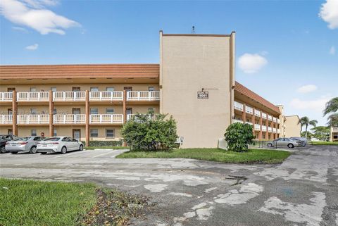 Photo of 9041 Sunrise Lakes Blvd #107, Sunrise, FL 33322 (MLS # A11891700)