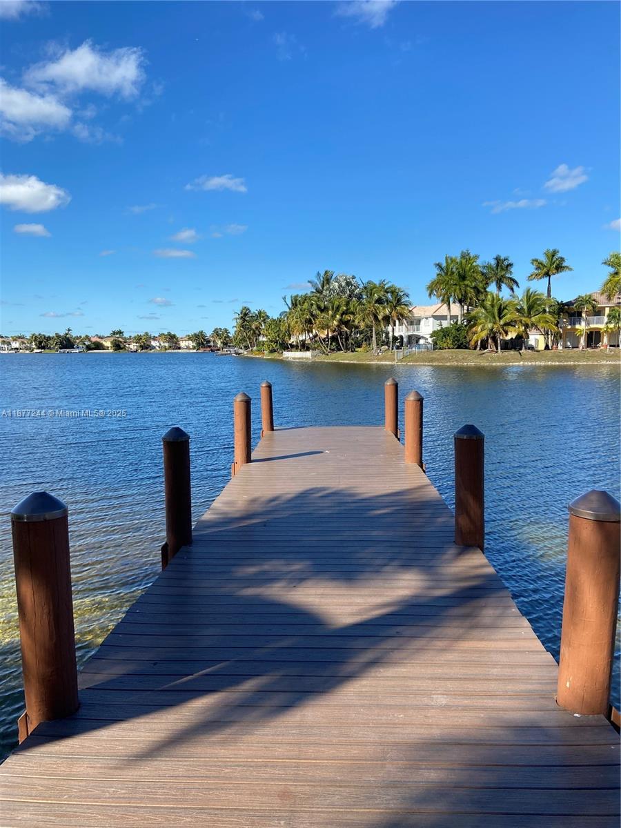 Fantastic condo at the exclusive Doral Isles with lake views. 1710 SQ, 2 bed + 2 baths + denn ( Can be office. 2nd living room or 3er bedroom). Washer and Dryer inside the unit. Large kitchen. Water and Internet include in the rent. This luxury resort style community offers, 24hrs security, 3 pools, club house, fitness center, sauna, tennis & basketball & soccer courts, spa, restaurants, jogging trail, beach volleyball on beautiful surroundings with lakes and tropical gardens. Centrally located with quick access to highways and shopping center. A+ Schools. Available Oct 1st. 2 parking spaces. As per associations rules not pets. Rental Insurance required. With CTL please sent: last 3 months bank statements and payrolls. Full Credit Report and IDS, Police Report & rental application.