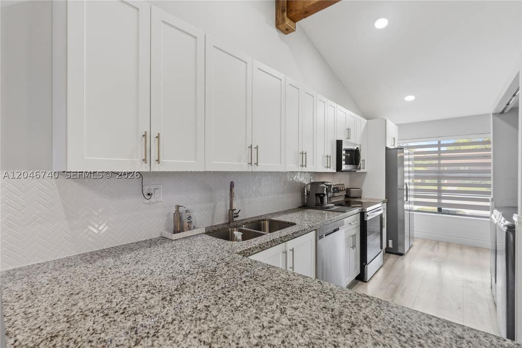 Photo of 10311 Laurel Ct, Pembroke Pines, FL 33026 (MLS # A12046740)