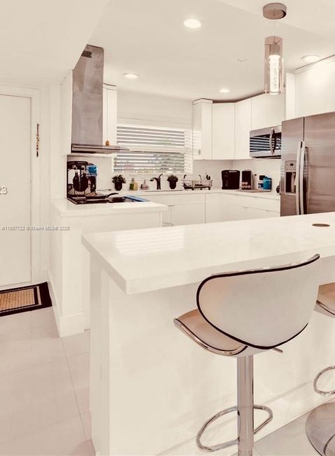 Photo of 9321 Sunrise Lakes Blvd #305, Sunrise, FL 33322 (MLS # A11857722)