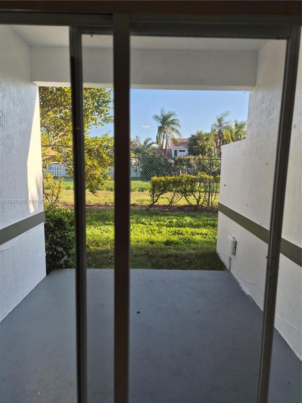 Photo of 9960 NW 19th Pl, Sunrise, FL 33322 (MLS # A11987080)