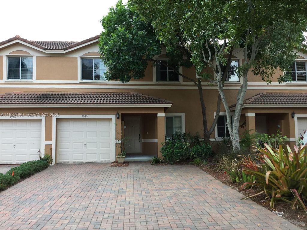 Photo of 9960 NW 19th Pl, Sunrise, FL 33322 (MLS # A11987080)