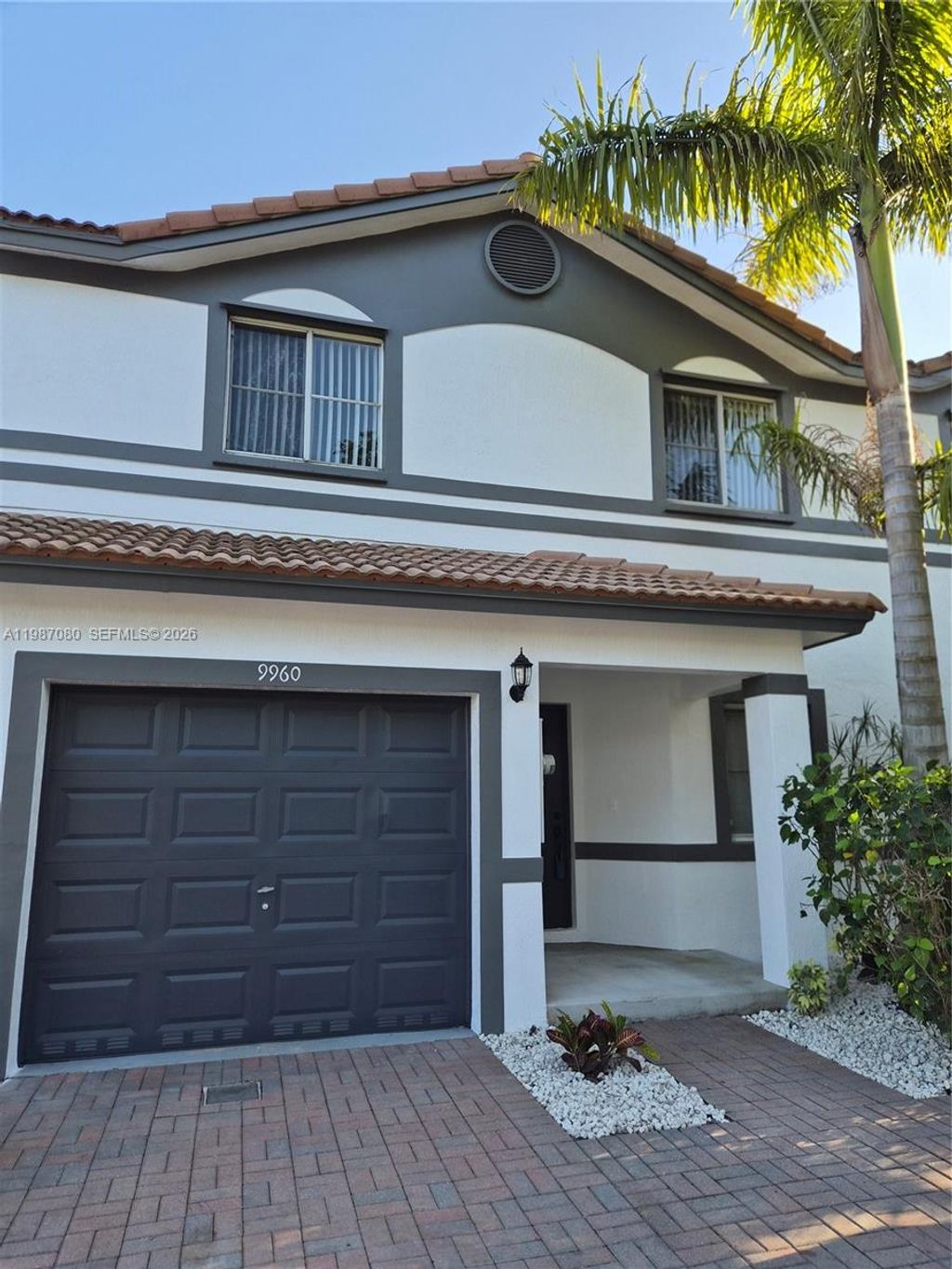 Photo of 9960 NW 19th Pl, Sunrise, FL 33322 (MLS # A11987080)