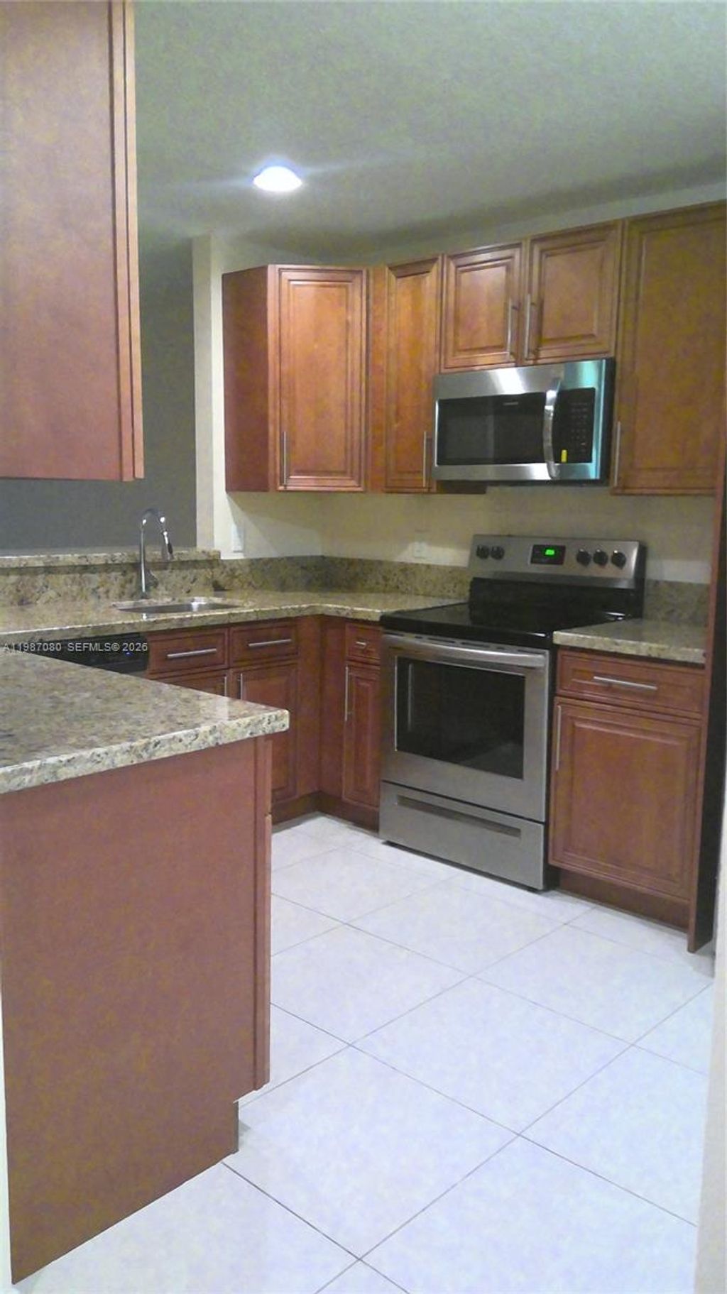 Photo of 9960 NW 19th Pl, Sunrise, FL 33322 (MLS # A11987080)