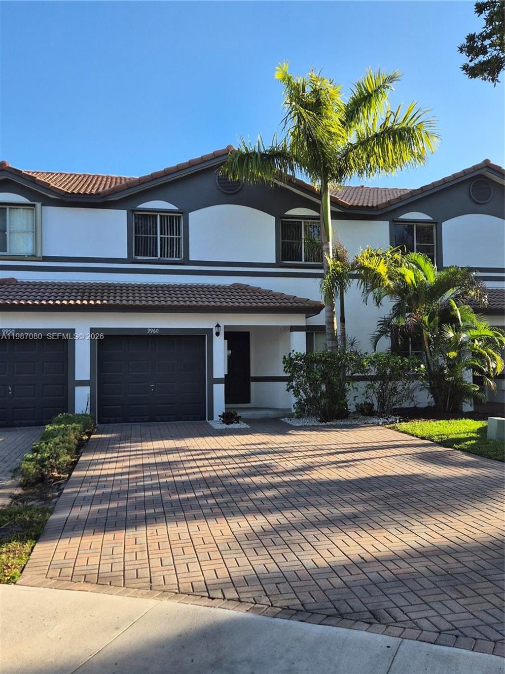 Photo of 9960 NW 19th Pl, Sunrise, FL 33322 (MLS # A11987080)