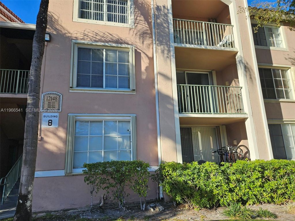 Photo of 12148 Saint Andrews Pl #205, Miramar, FL 33025 (MLS # A11966541)