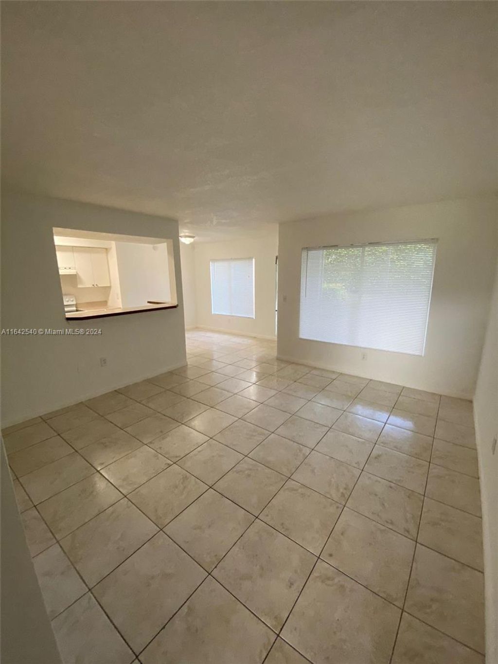 Photo of 815 W Boyton Beach Blvd #8-102, Boynton Beach, FL 33426 (MLS # A11642540)