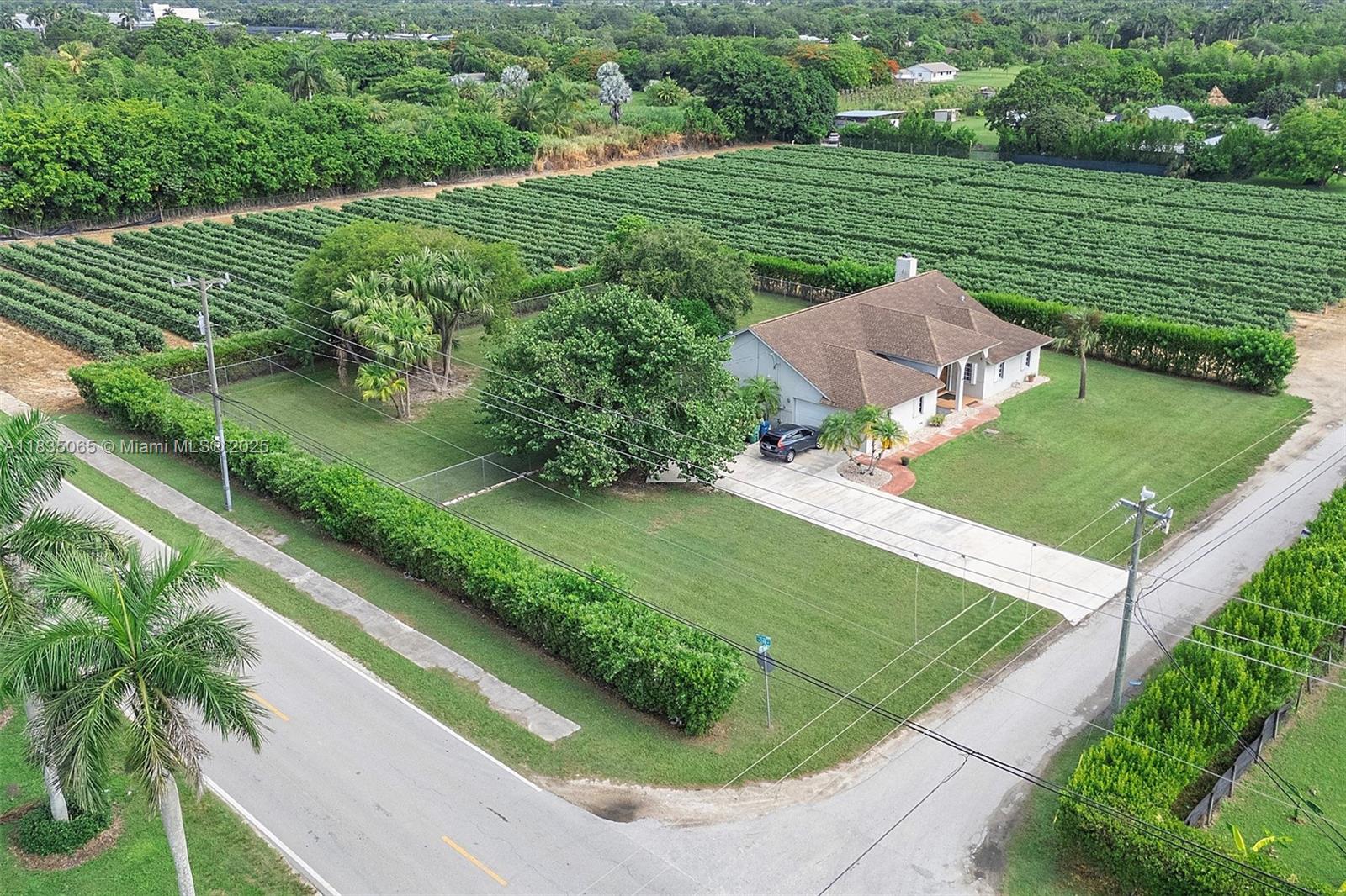 Sitting on an oversized 30,000+ sq ft corner lot, this Redland gem offers space, comfort, and unbeatable location, just half a mile from the famous Knaus Berry Farm! Featuring 3 generously sized bedrooms, a 2-car garage, and accordion shutters throughout, this home blends peace of mind with everyday functionality. The expansive lot provides endless possibilities, build a pool, park your toys, or create your dream outdoor oasis. Don’t miss this rare opportunity to own a slice of country charm with city convenience!