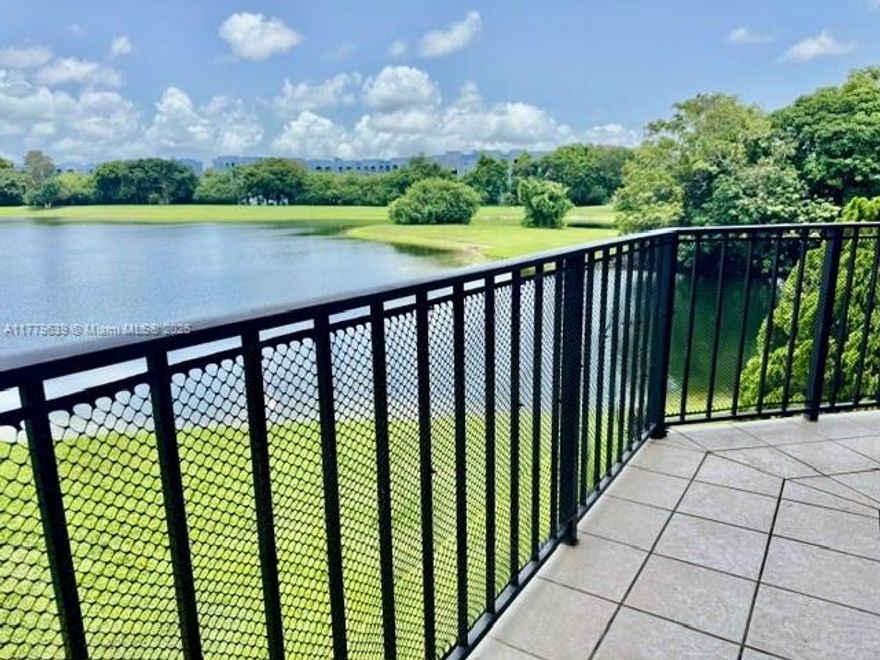 This is an ideal property for investment or home ownership! This unit boasts the largest floor plan in the complex offering 2 bedrooms/2 bathrooms with 1227 sq ft of bright, open living space.  Experience stunning lake views from every room and from your oversized wrap around private balcony.  Perfect for someone looking to customize to their own taste.  The building is in the process of completing upgrades throughout including impact windows on the exterior. brand new A/C unit and hot water heater have been installed in unit. Located in the desirable Fontainebleau Park Community, enjoy the convenience of being close to shopping, dining, major highways and great schools.  Must See!