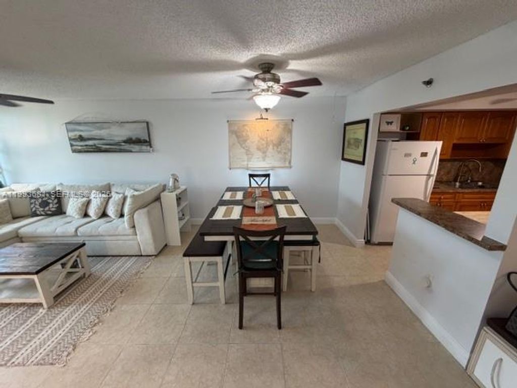 Photo of 1100 Saint Charles Pl #L6, Pembroke Pines, FL 33026 (MLS # A11993681)