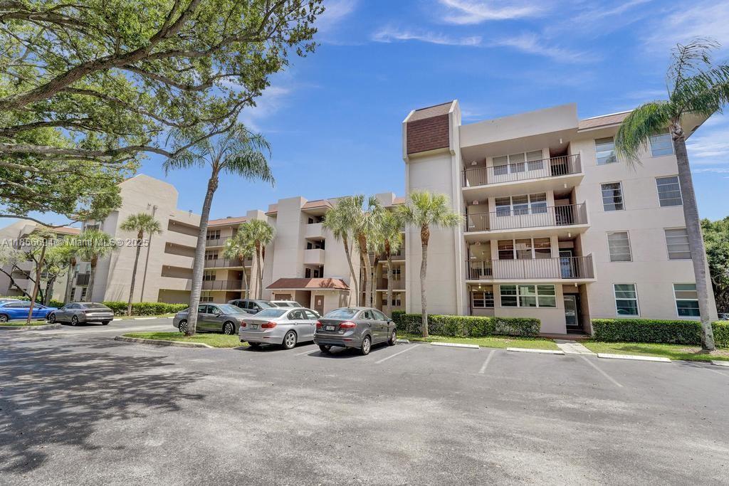 RARELY AVAILABLE AT THIS PRICE! Welcome to this spacious 3 bedroom, 2 bathroom corner-unit condo in the highly desirable Sabal Palm community of Pine Island Ridge — an all-ages neighborhood nestled around a private golf course. Enjoy over 1,000 sq ft of living space, complete with a screened-in porch offering serene golf course views. The home features tile flooring throughout the main living areas, an in-unit washer and dryer, and plenty of natural light. Located in a top-rated school district and just minutes from shopping, dining, and major highways — truly a central location! Monthly maintenance includes membership to the exclusive Pine Island Ridge Country Club, offering access to 2 restaurants, golf, tennis, pool, gym, and more! **BUY & RENT IMMEDIATELY**