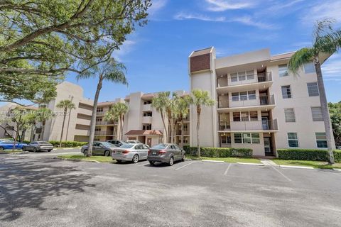 Photo of 9520 Seagrape Dr #306, Davie, FL 33324 (MLS # A11856694)