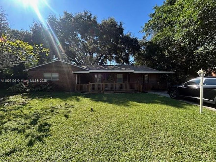 Investors & Fix-n-Flip Opportunity! Discover this charming ranch-style SFH in the desirable Green Acres com. (West Lakeworth). With nearly 2,000 sq ft. of living space, this property is primed for some TLC to unlock its full market potential, with resale estimates in the mid-$600k range. The home is in overall good condition & is situated on an expansive 17,000 sq ft. lot, graced by mature trees that enhance its character & provide a delightful shade. Nestled on Woodmere Lane, a quaint cul-de-sac street measuring just 600 feet in length, you'll fall in love with the beauty of the towering palm trees lining the road. This exclusive community comprises only 10 residences on similarly sized lots, making it an idyllic location for full-time living, 2nd home, or a lucrative Airbnb investment.