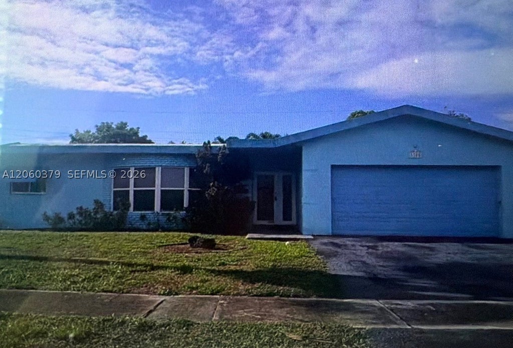 Photo of 3700 NW 25th St, Lauderdale Lakes, FL 33311 (MLS # A12060379)