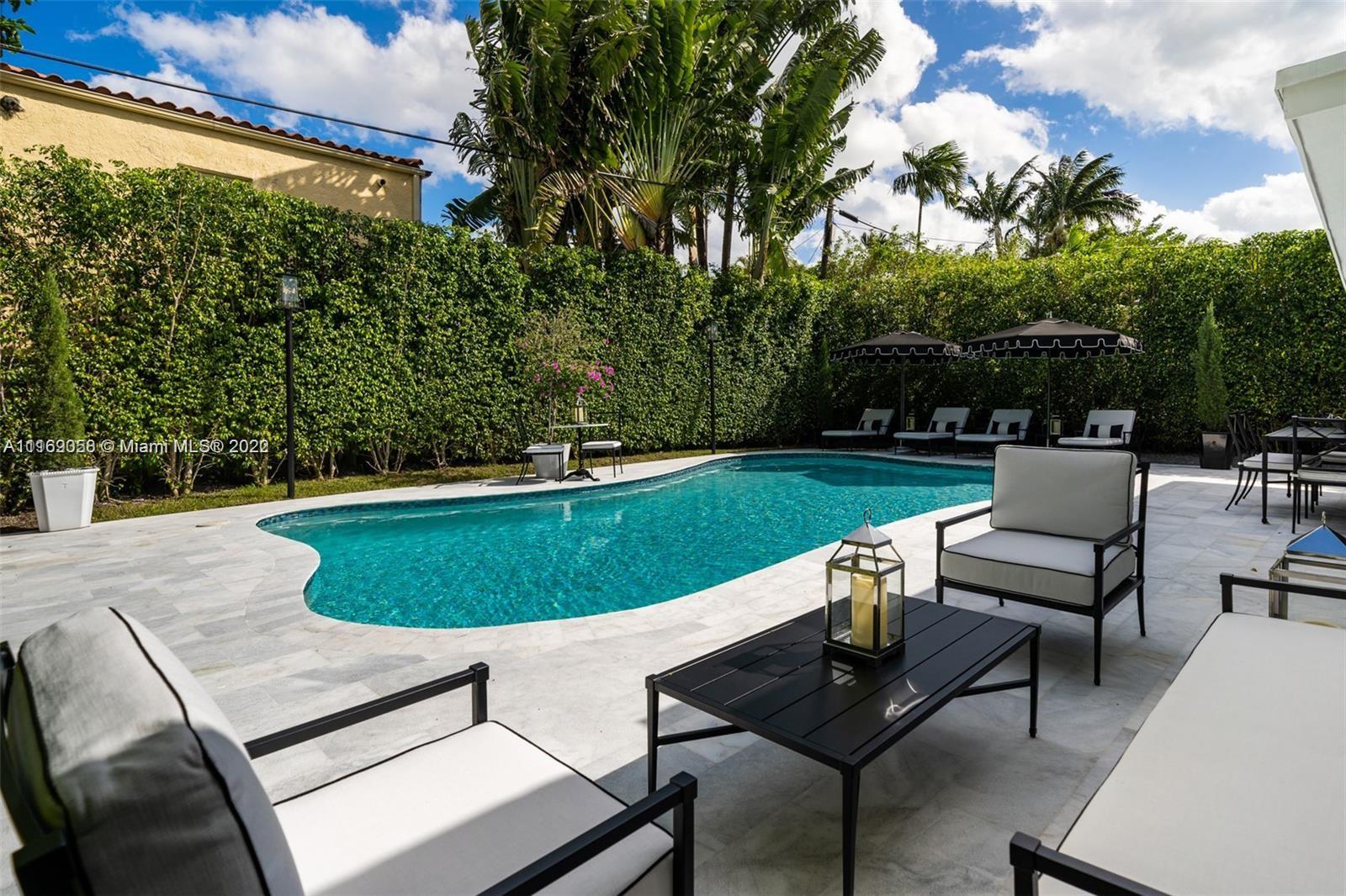 Located on the Coveted La Gorce Drive sits this secluded home surrounded by lush landscaping creating your private Miami Beach oasis. The property has been completely renovated to feature 5 Beds, 4.5 Baths while still maintaining an open flow concept with formal and informal living spaces and sliding glass doors leading into the backyard entertaining spaces. The master bedroom suite features a custom bathroom, white oak floors and a walk-in closet. The spacious guest bedrooms with custom marble showers and a flex space perfect for a home office, gym or study. Enjoy being just minutes to top area beaches, restaurants, shopping and schools.