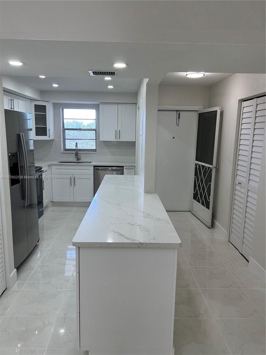 HI-GREENS OF INVERRARY - Residential