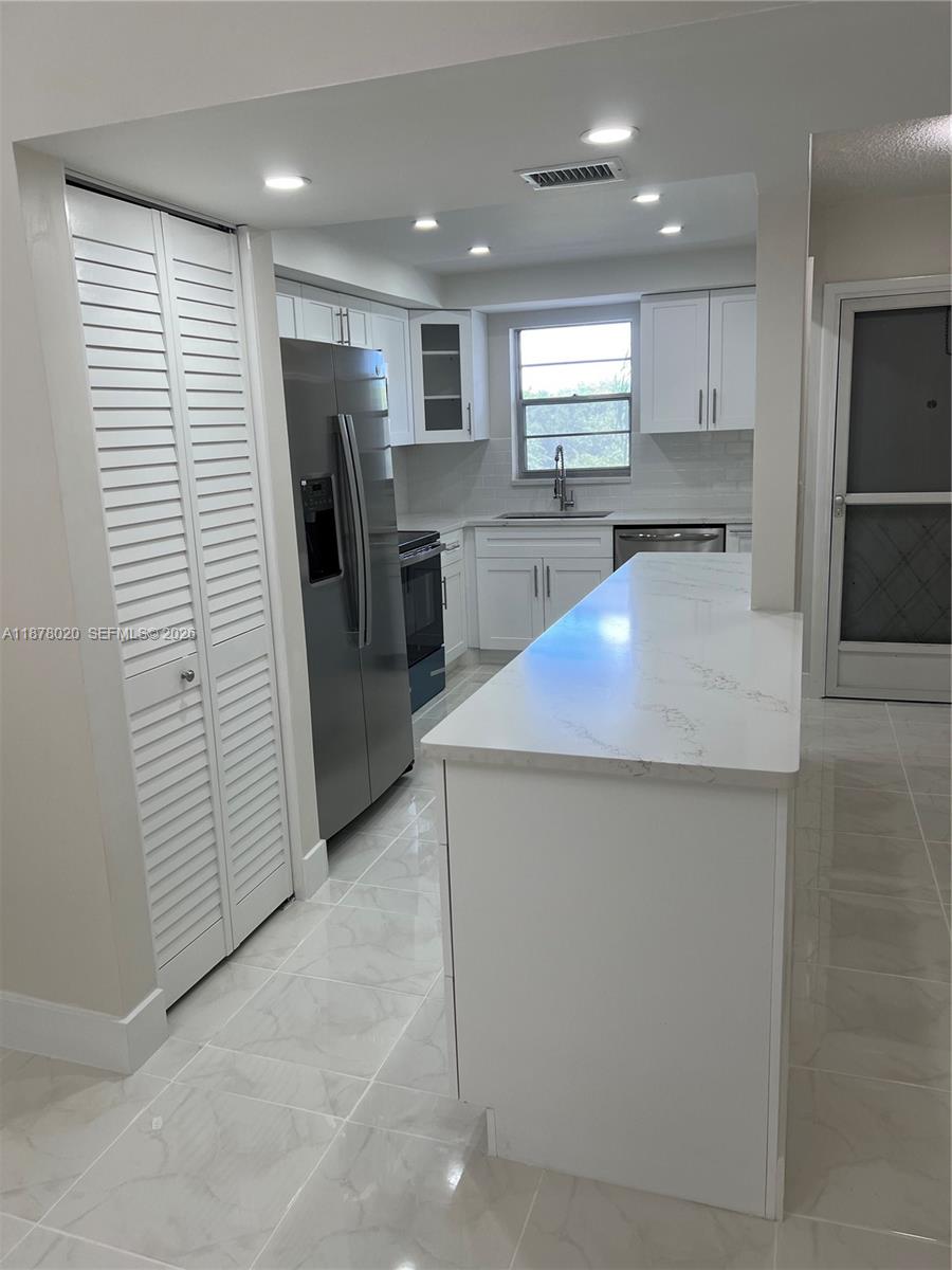 HI-GREENS OF INVERRARY - Residential