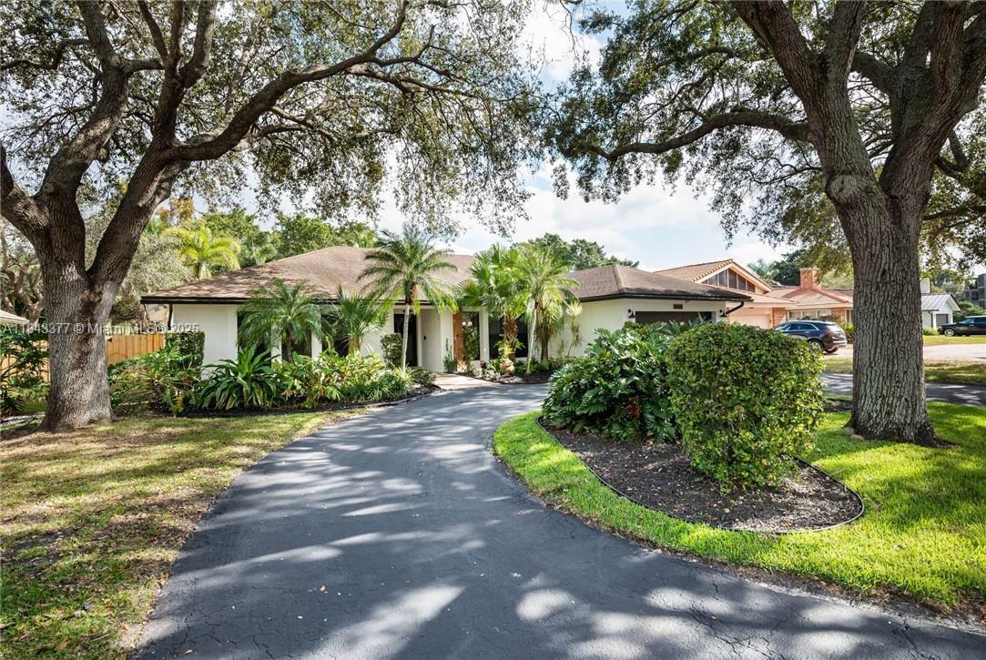 ******* Seller Motivated — All Offers Welcomed! ******* Experience refined Florida living in this exquisite 5-bedroom, 3-bath pool home boasting serene lake views from the front of the home and Jacaranda Golf Course views from the back of the home. Nestled on a quiet cul-de-sac, this spacious residence sits on over one-third of an acre, offering privacy and elegance. Inside, the split-bedroom floor plan features an open-concept living area, formal dining room, cozy family room, a versatile den and a junior master suite, ideal for guests or multi-generational living. Recent upgrades include a 2023 roof, 2023 water heater, newer AC, hurricane-impact coverage, and a hard-wired generator hookup for reliable backup power. Minutes from major highways, hospitals, and everyday conveniences.