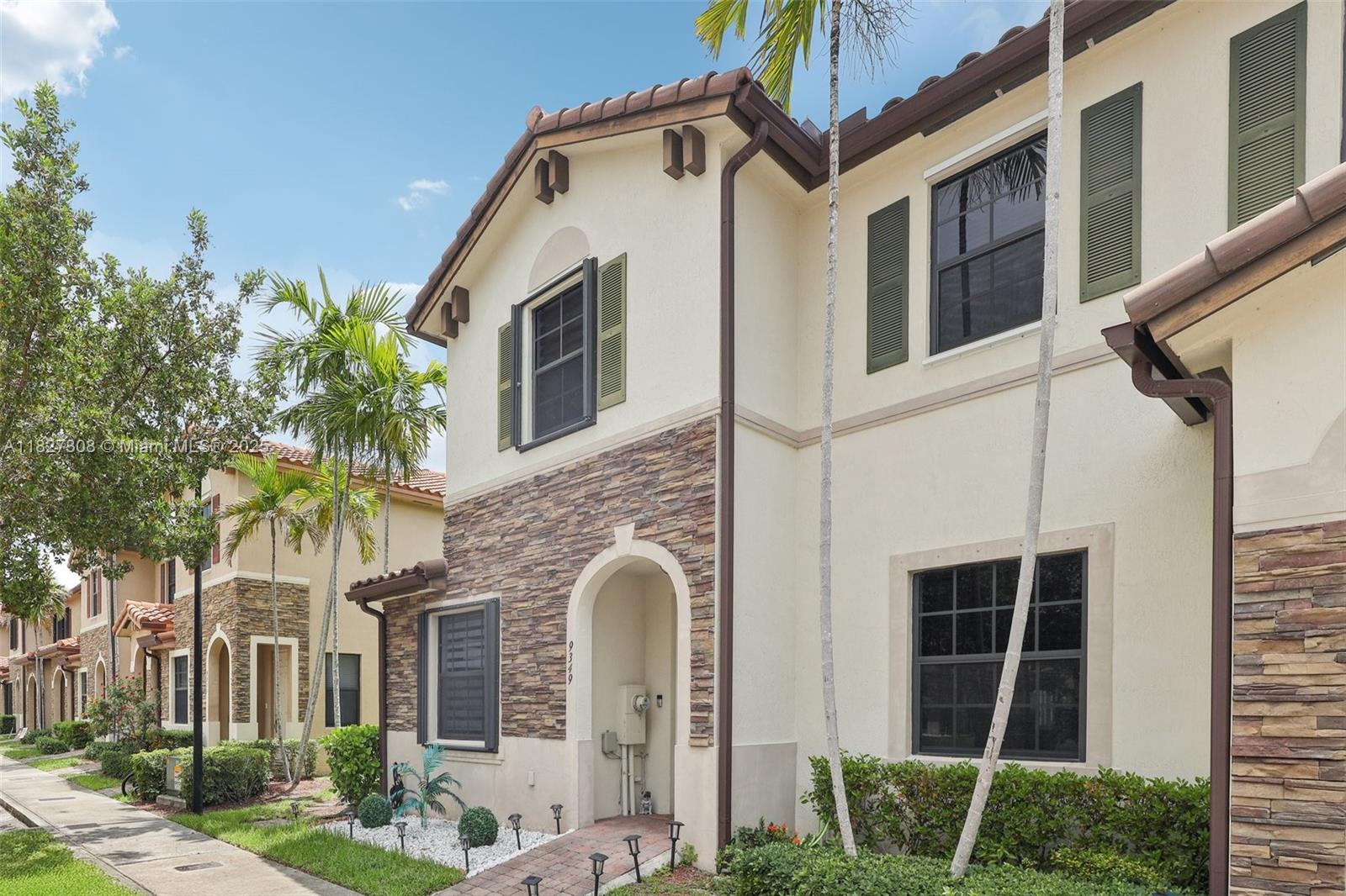 This beautifully updated corner townhouse is located in the gated community of Bonterra. The home features accordion shutters, tile flooring throughout both the first and second floors, and upgraded bathrooms. The kitchen boasts a stunning granite countertop with a waterfall edge. Enjoy outdoor living in your private backyard, complete with travertine pavers and a charming pergola. Bonterra offers fantastic amenities, including a clubhouse, resort-style pool, gym, basketball, and soccer courts. With modern upgrades throughout, this home is move-in ready. Don’t miss out—schedule your showing today!