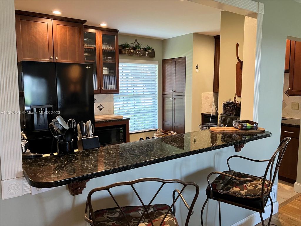 Photo of 18349 SE Wood Haven Ln #A, Jupiter, FL 33469 (MLS # A11375345)