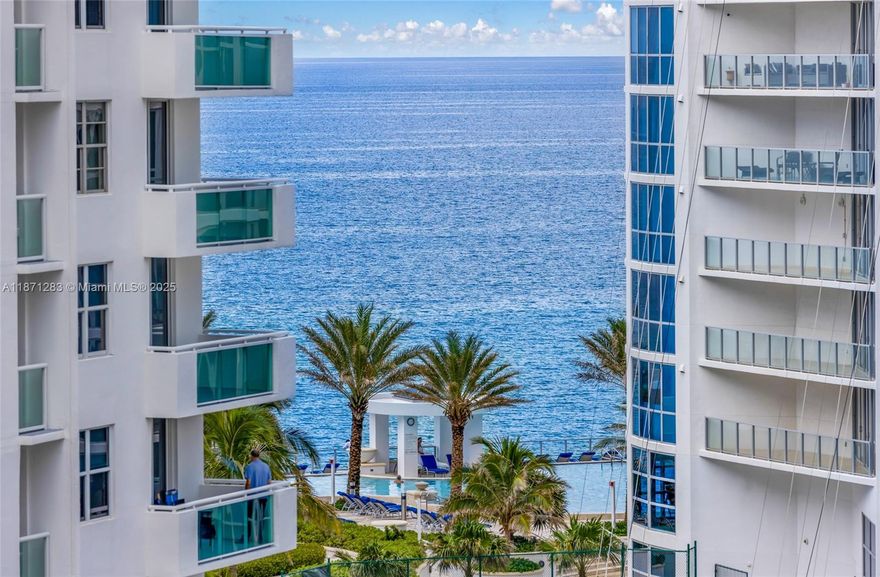 Discover a spacious residence offering stunning views of city lights and ocean waves! Step onto brand-new vinyl floors and enjoy the security of hurricane-proof glass doors and windows. Embrace the ultimate beach lifestyle in a newly renovated building with exceptional amenities: direct beach access, resort-style pools with cabanas, a relaxing jacuzzi, a fully-equipped gym, and a convenient business center. Perfectly situated just a 2-minute walk from the Diplomat Resort and a 15-minute walk to the renowned Hollywood Boardwalk, brimming with diverse dining and shopping options. Plus, it's a quick 15-minute drive to Fort Lauderdale International Airport. Laundry on each floor. Appliances are super well-conserved; a new vinyl floor and high-impact windows exist. Publix is next door.