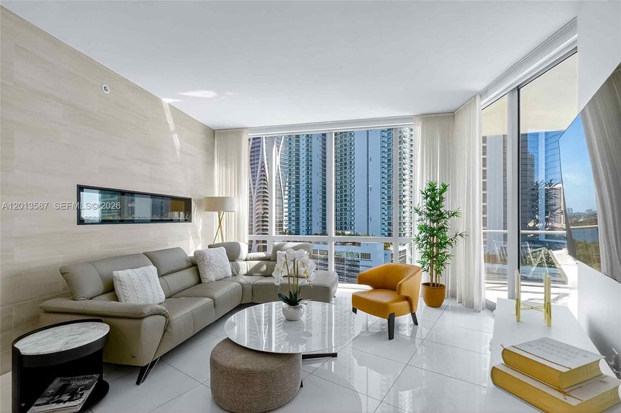 Step into this stunning water-view oasisa fully furnished 2-bedroom + den, 3-bathroom residence where style, luxury, and convenience converge. The spacious primary suite features a walk-in closet and pristine en-suite bathroom, while the living area, complete with a fireplace, offers the perfect setting to unwind with friends or family against breathtaking city views. The second bedroom includes its own private bath, and the den, with a queen-size modern American Leather sofa and sliding barn door, can easily convert into a third bedroom with a full guest bathroom just across the hallway. Move-in ready with your own private parking space and valet included. No pets allowed.