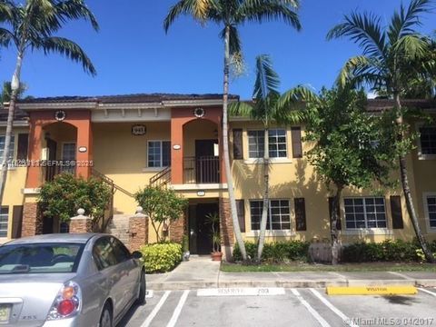 Photo of 945 NE 33rd Ter #203, Homestead, FL 33033 (MLS # A11929713)