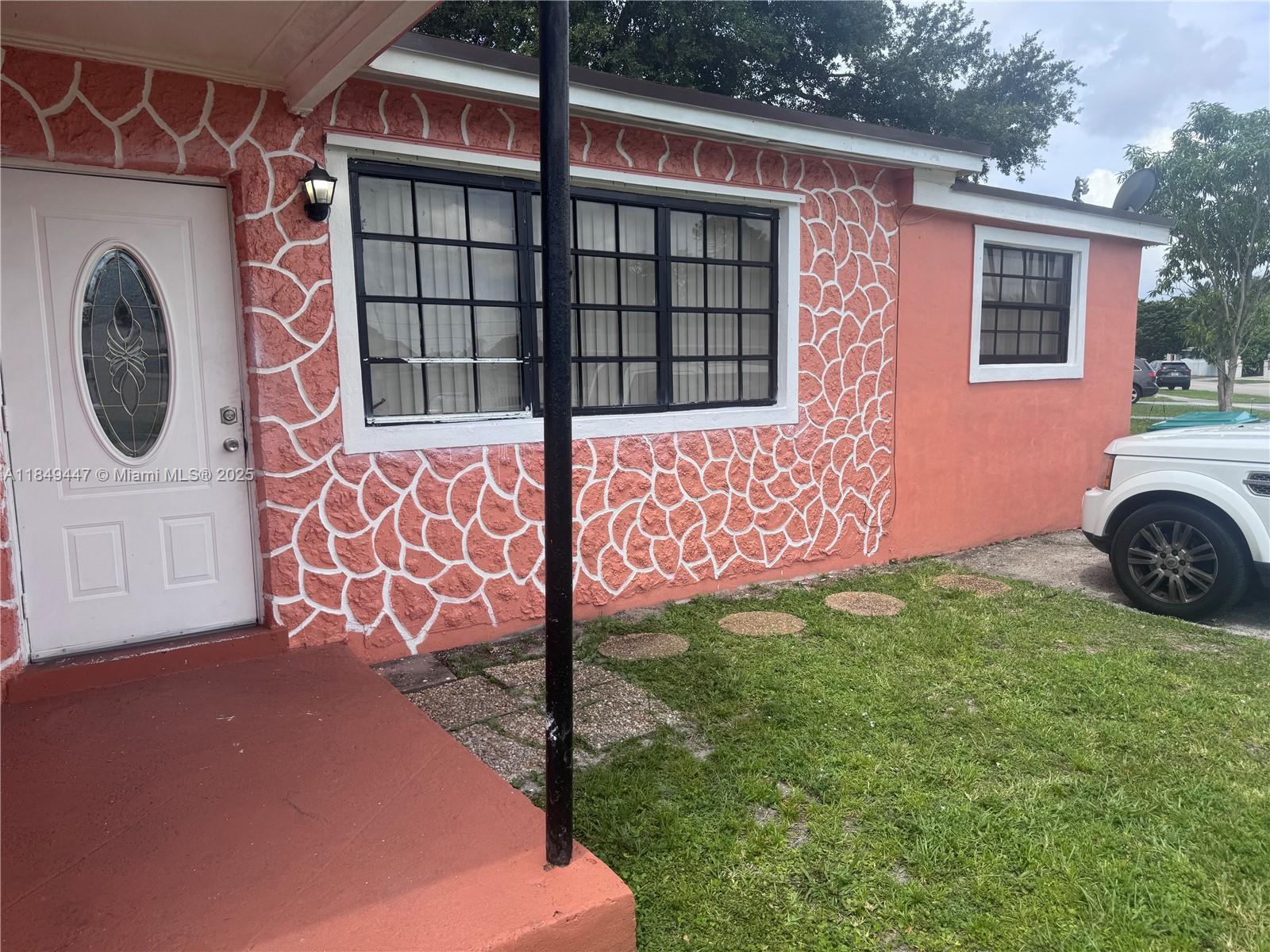 Don’t miss this prime opportunity in a great location! This spacious 4-bedroom, 3-bathroom home sits on an oversized corner lot with endless possibilities. Perfect for investors or anyone looking for extra income, the property includes a 1-bed, 1-bath unit with a private entrance and driveway—currently rented month-to-month. Features include a newer roof (2022), ample parking, and proximity to major roads, shopping, and more. Fantastic potential to customize, expand, or generate income right away!