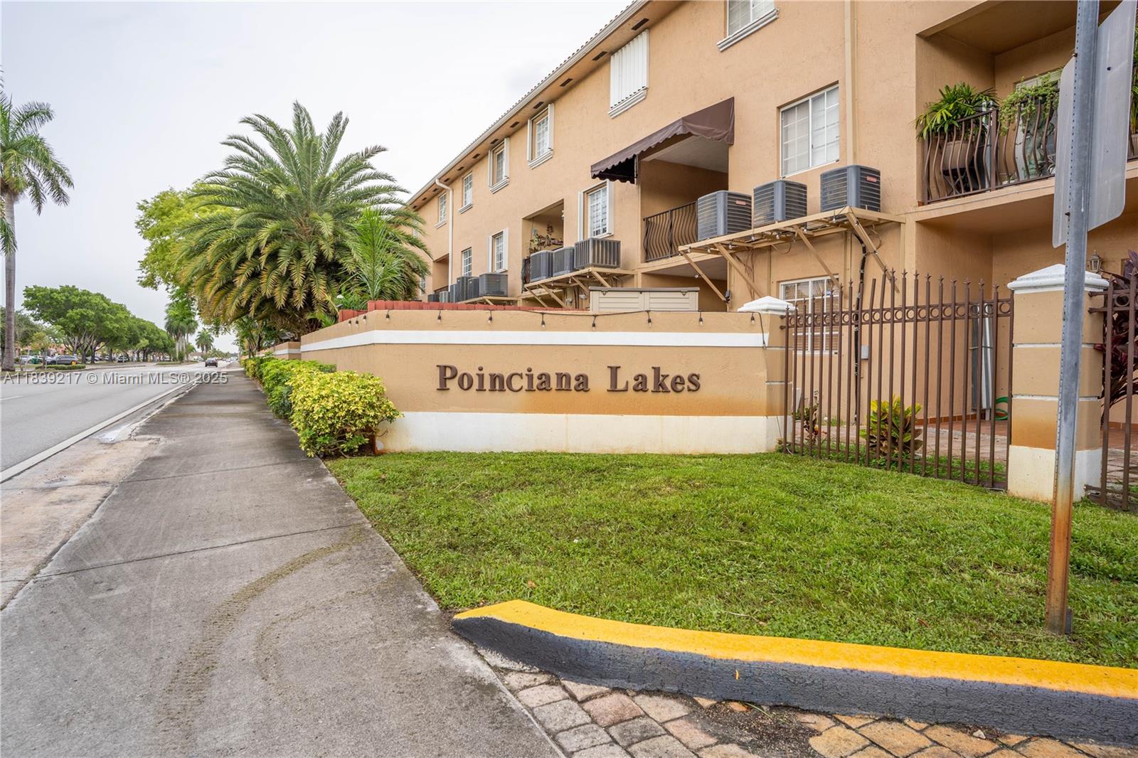 Welcome to this well-maintained 3-bedroom, 2-bathroom first-floor corner unit located in the desirable community of POINCIANA LAKES VILLAS. This spacious condo offers tile floors throughout, a bright open living and dining area, and a balcony. The kitchen features ample cabinet space and a convenient layout. Bedrooms are generously sized, with the primary suite offering a walk-in closet and en-suite bathroom. Unit 101 includes two corner assigned parking space with guest parking available. Conveniently located near schools, shopping, dining, major highways, and parks. Perfect for first-time buyers or investors—don’t miss out on this opportunity!